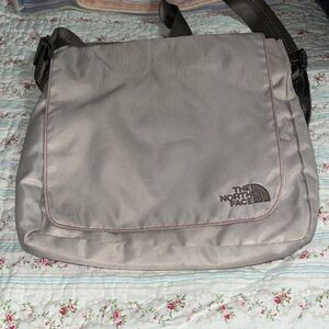 The North Face nylon crossbody bag.  In EUC, lots of pockets. Clean.